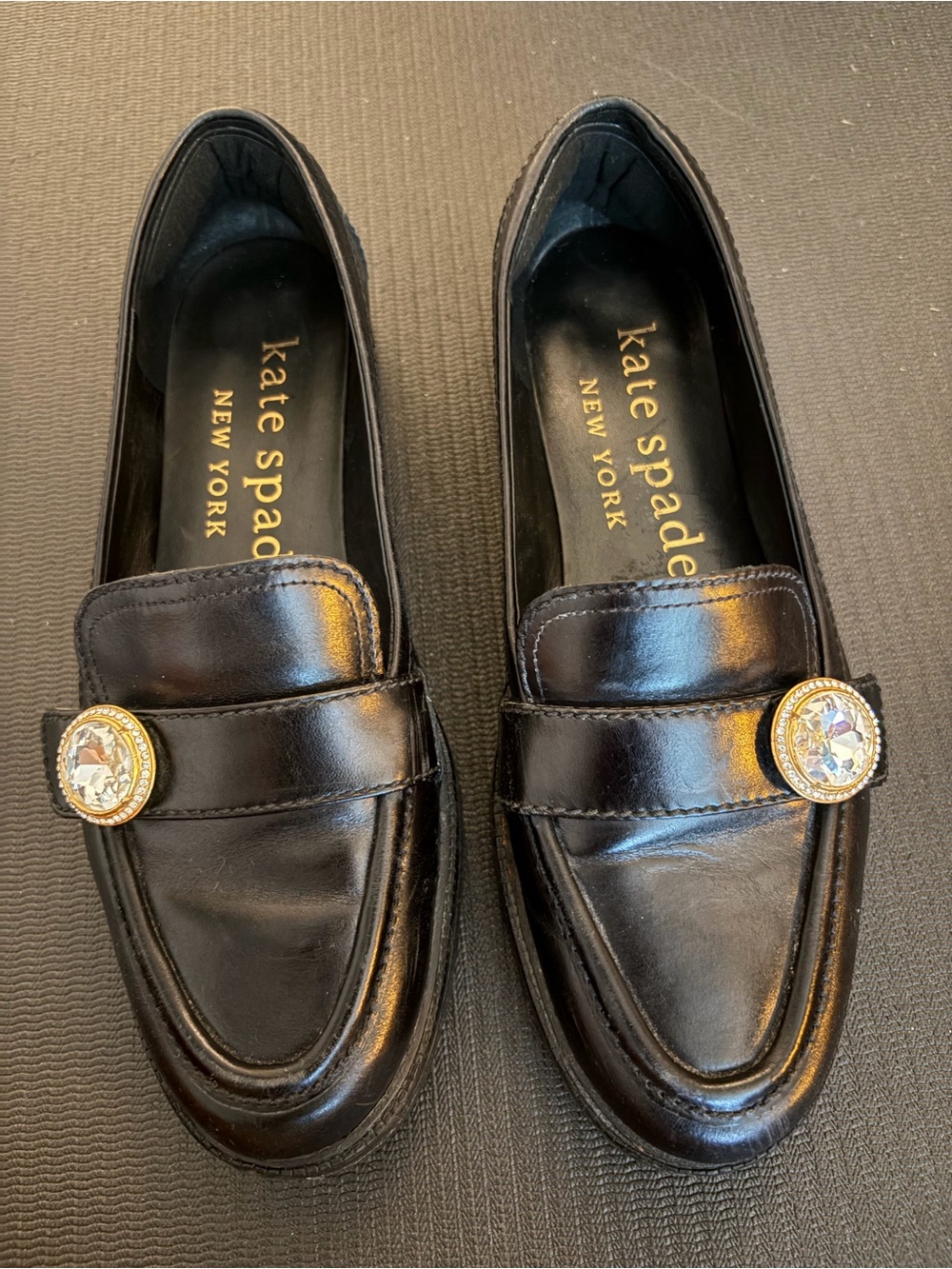 kate spade Black Leather Posh Loafers with Gold-Tone Medallion